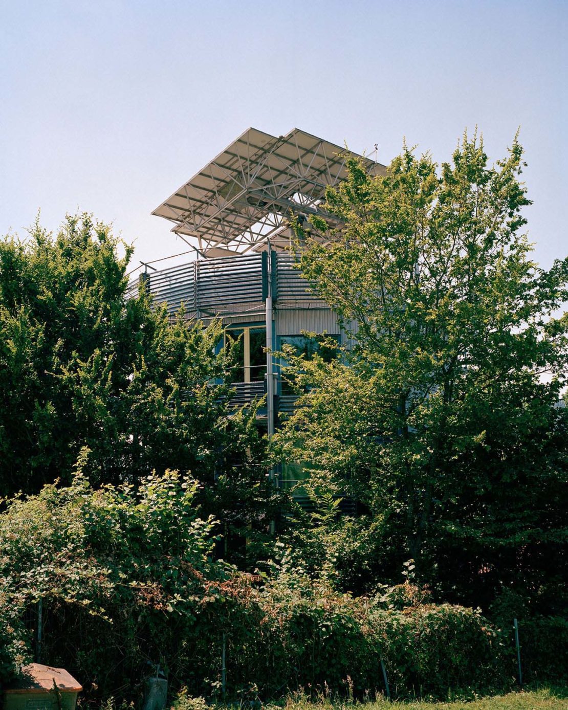An experimental house, with roof solar panels and a spinning mechanism to follow sunlight, built by resident Rolf Disch in 1994