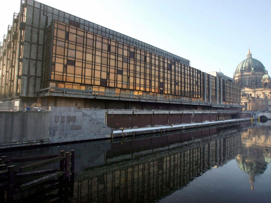The vast glass structure of the Palace of the Republic in Berlin was stripped and dismantled in the 1990s   