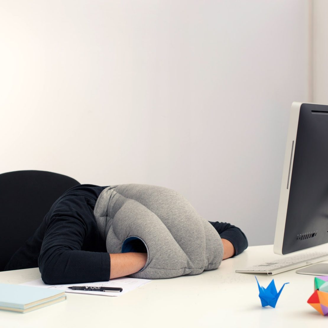 The Ostrich Pillow, for at-desk sleeping