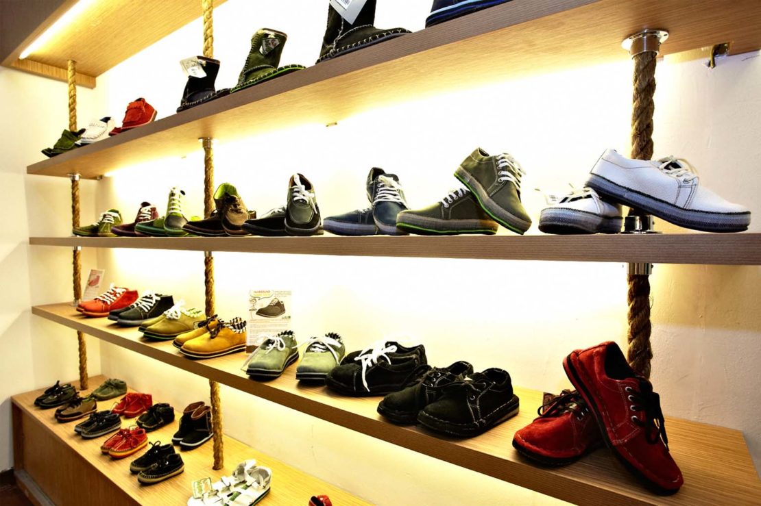 Dozens of soleRebels shoes on display at one of its shops