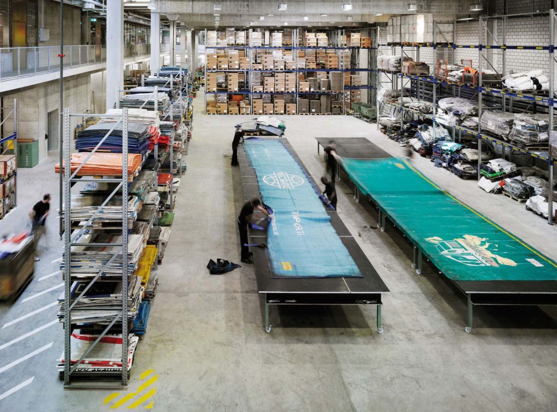 Freitag's factory, where lorry tarpaulins are laid out for cutting
