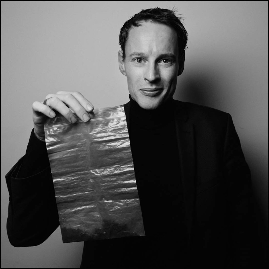 Daan Roosegaarde holds a bag of collected smog particles